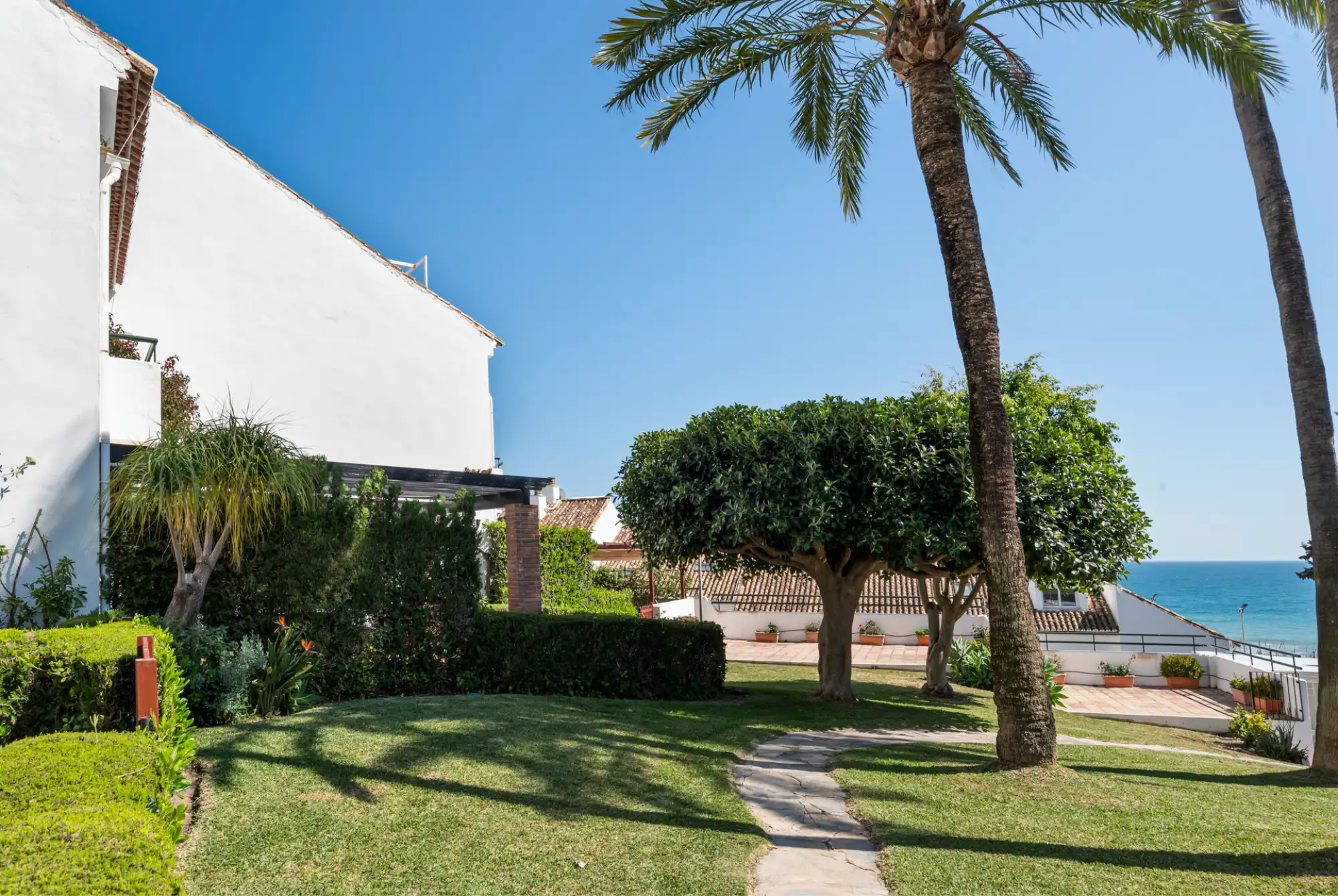 Frontline Beach Townhouse in Estepona West - Top Properties Estepona